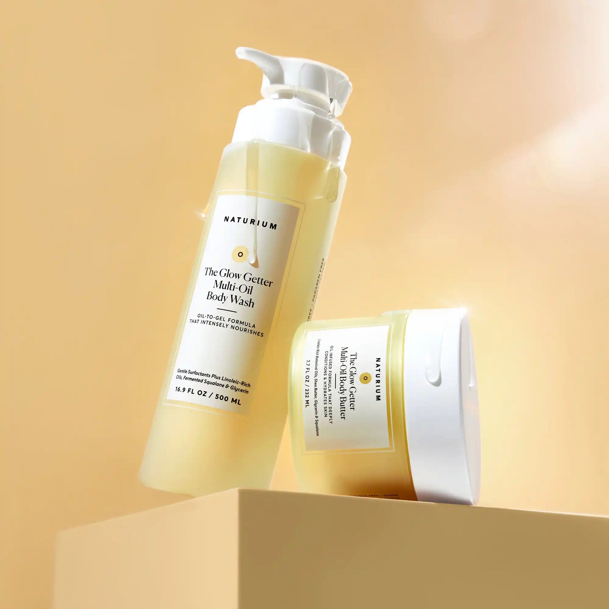 the-glow-all-out-body-bundle-l0 gg-bodybutter_1464-crop_revcolor_FL.webp
